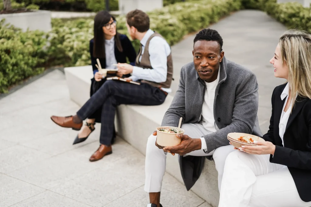 Colleagues take a break together outside